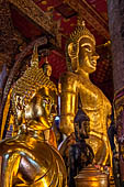 Luang Prabang, Laos - Wat Mai, detail of the Buddha altar inside the sim. 